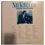 Collection of Vintage Vinyl Records Including Nat King Cole and Puccini