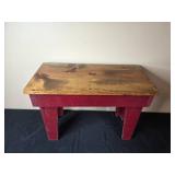 Rustic Wooden Bench with Red Legs