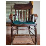 Wooden Chair with Armrests and Green Seat Cushion