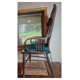 Wooden Chair with Armrests and Green Seat Cushion