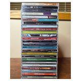 Collection of Music CDs Featuring Various Artists and Genres