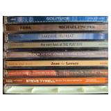 Collection of Music CDs Featuring Various Artists and Genres