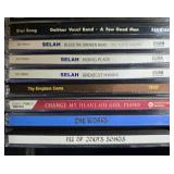 Collection of Music CDs Featuring Various Artists and Genres