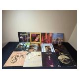 Collection of Vintage Vinyl Records Featuring Various Artists