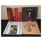 Collection of Vintage Vinyl Records Featuring Various Artists