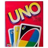 Collection of UNO Games, Connect 4, and Wee Sing Songs Books