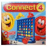 Collection of UNO Games, Connect 4, and Wee Sing Songs Books