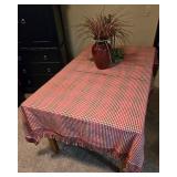 Wooden Dining Table with Tiled Top and Red Checkered Tablecloth