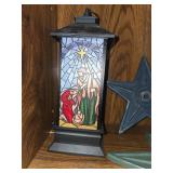 Assorted Decorative Items: Nativity Lantern, Gas Station Miniature, Stars, and Candle Holder