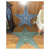 Assorted Decorative Items: Nativity Lantern, Gas Station Miniature, Stars, and Candle Holder