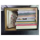 Large Assortment of Holiday Cards, Gift Boxes, and Candy Cane Pens