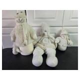 Collection of Holiday Decor Including Snowmen and Christmas Trees