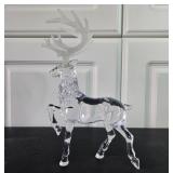 Collection of Holiday Decor: Glass Trees, Acrylic Figurines, and Angels