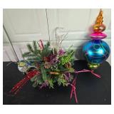 Assorted Christmas Decor Including Ornament, Centerpiece, and Banners