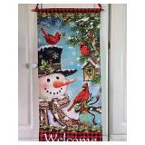 Assorted Christmas Decor Including Ornament, Centerpiece, and Banners