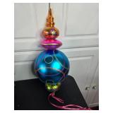 Assorted Christmas Decor Including Ornament, Centerpiece, and Banners