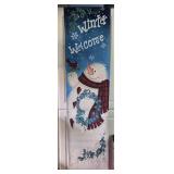 Assorted Christmas Decor Including Ornament, Centerpiece, and Banners