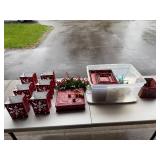 Collection of Holiday Decor: Red Themed Candle Holders, Nested Gift Boxes, and Wall Ornament
