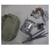 VEHICLE JACK AND CHAINS IN A CANVAS BAG