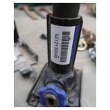 VEHICLE JACK AND CHAINS IN A CANVAS BAG