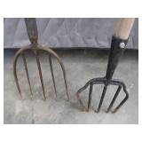 TWO VINTAGE FISHING SPEARS