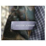 CARRY ON LUGGAGE FULL OF DESIGNER TIES