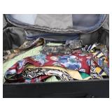 CARRY ON LUGGAGE FULL OF DESIGNER TIES