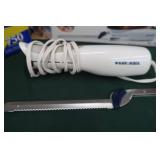 BLACK AND DECKER ELECTRIC KNIFE AND PLASTIC FOOD WRAP