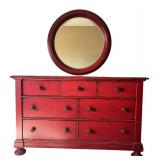 Red Dresser with Circular Mirror