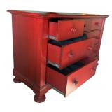 Red Dresser with Circular Mirror