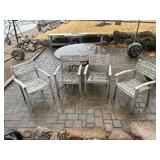 Four Teak Patio Chairs