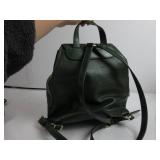Michael Kors Pebble Leather Moss Green Medium Backpack HAS A USED SMELL, HAS SCUFFS AROUND BUTTON AND BOTTOM, USED