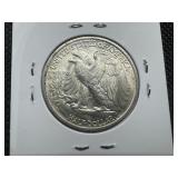 1941 S Uncirculated Walking Liberty Half, Very Slight Black Deposits on Reverse Rim Otherwise Full Mint Lustre and Blemish Free