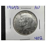 1969 D High Grade Kennedy Half Au or Better