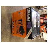 RIDGID 6 Gal. 150 PSI Portable Electric Oil-Free Jobsite Pancake Air Compressor with 25 ft. Air Hose and 18GA Brad Nailer  Customer Returns See Pictures