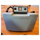 Collection of Vintage Cameras: Kodak, Polaroid Super Shooter, and Polaroid 220