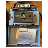 Collection of 4 Vintage Polaroid Cameras with Accessories