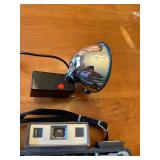 Collection of 4 Vintage Polaroid Cameras with Accessories