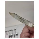 Mixed Set of Stainless Steel and Silver Plated Flatware