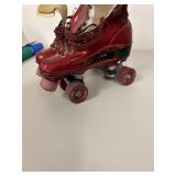 Vintage Red Roller Skates with Leather Laces Appear to be a Women