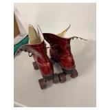 Vintage Red Roller Skates with Leather Laces Appear to be a Women