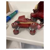 Vintage Red Roller Skates with Leather Laces Appear to be a Women