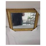 Framed Gold Mirror with Ornate Border Design