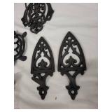 Collection of Cast Iron Decorative Items including Turtle Trivets and Wall Sconces