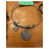 Collection of Costume Jewelry Necklaces and Bracelets with Metallic Pink Bag