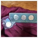 4-Eisenhower Dollars, (1 is a proof, 1UNC/60 grade)