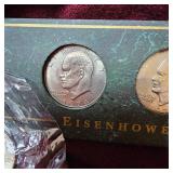 4-Eisenhower Dollars, (1 is a proof, 1UNC/60 grade)