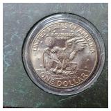 4-Eisenhower Dollars, (1 is a proof, 1UNC/60 grade)