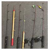 Six Fishing Poles with Two Red Wolf Reels
