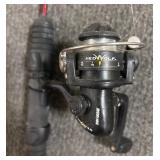 Six Fishing Poles with Two Red Wolf Reels